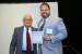 Dr. Nagib Callaos, General Chair, giving Dr. Christopher N. Amos the best paper award certificate of the session "Educational Research, Theories, Practice and Methodologies". The title of the awarded paper is "Coaching and Sponsoring Extra-Curricular Activities: Does it Make Future Principals Better School Leaders?."